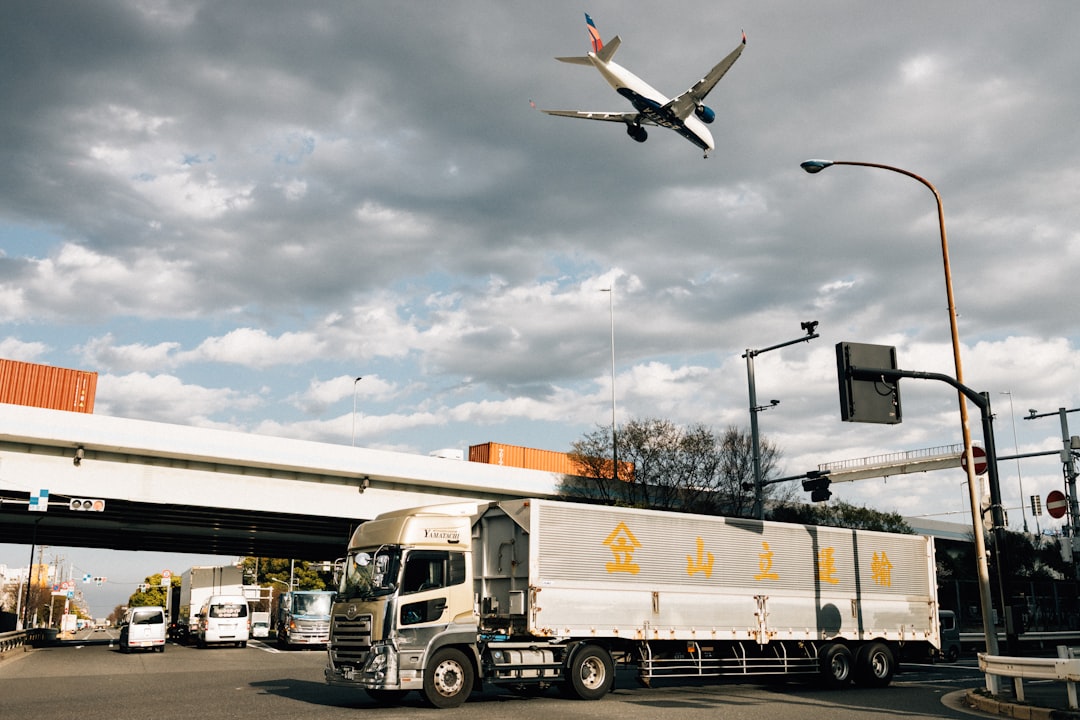 Mastering the First Impression: Your intriguing post title goes here an-airplane-flies-above-a-truck-on-a-road-nz53-9-ixo